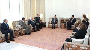 Maduro en de andere leden van de politieke raad van het ALBA op bezoek bij Assad in oktober 2011